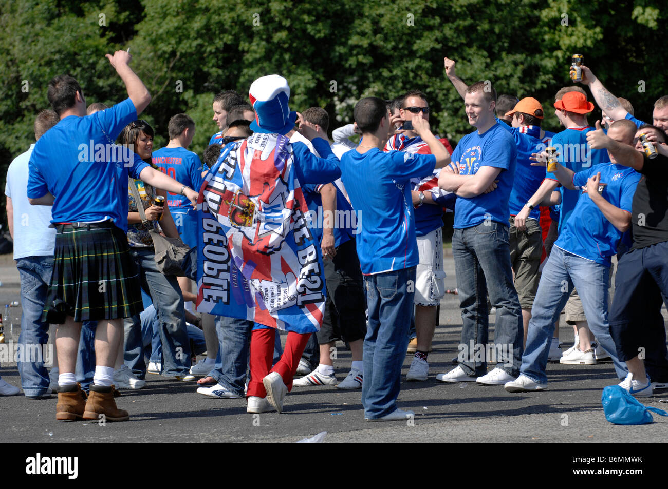 Glasgow Rangers fans gather at a motorway service area before the UEFA Cup Final 2008 against Zenit St Petersburg Stock Photo