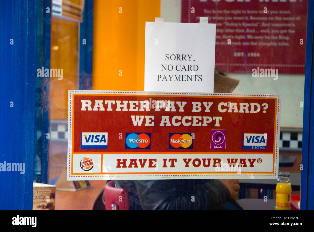 Credit card payments accepted and not accepted in Burger King at Leicester  Square in London England UK Stock Photo - Alamy