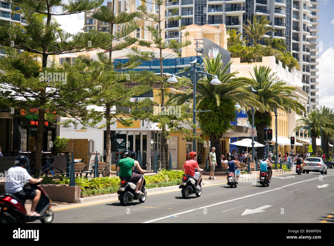 riding scooters gold coast Stock Photo Alamy