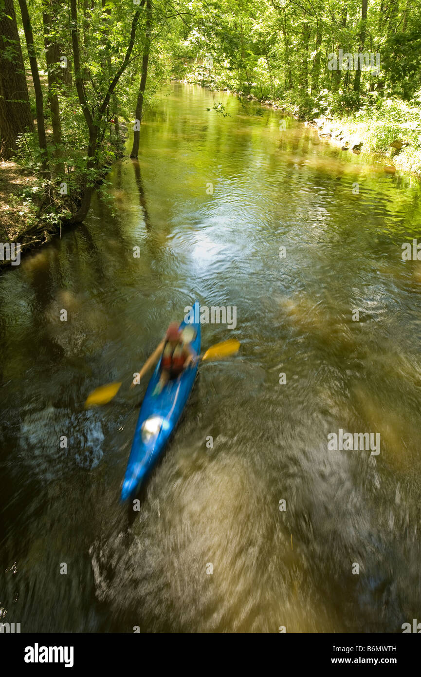 A KAYAKER IN MOTION ON MINNEHAHA CREEK Stock Photo
