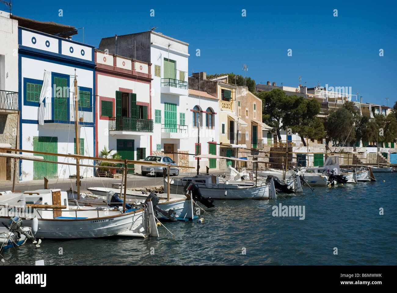 Sea front houses and boats, Porto Colom, Mallorca Stock Photo Alamy