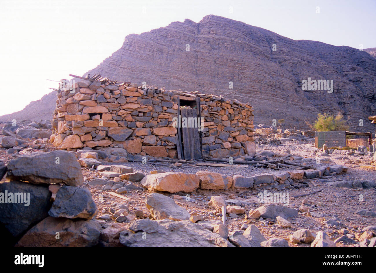 Abandoned home high in the Musandam Mountains. Rock built structure. Oman. Musandam Peninsula. Stock Photo