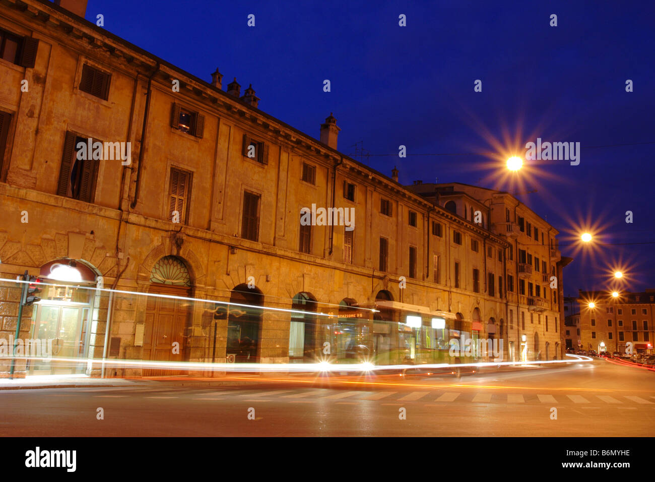 Verona street scene by night Stock Photo - Alamy
