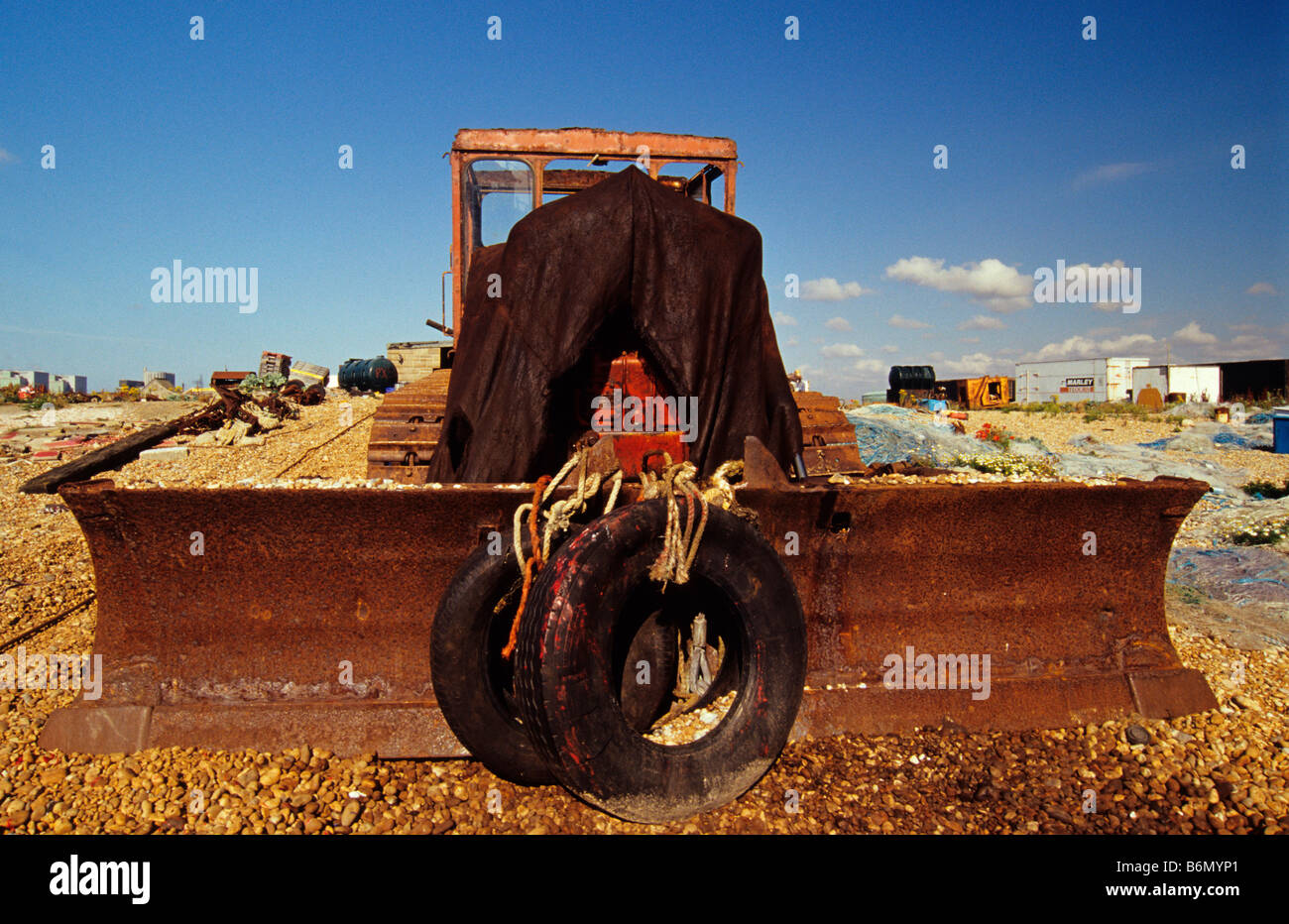 Bulldozer on Dungeness Beach Kent England UK Stock Photo - Alamy