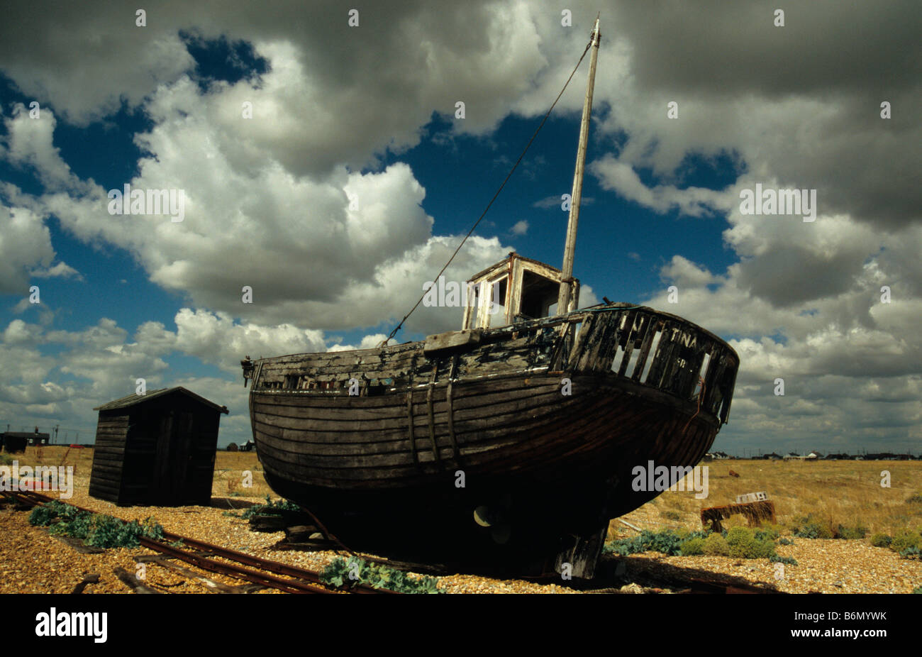 Derelict Fishing Boat on Shingle Beach Dungeness Kent England UK Stock ...