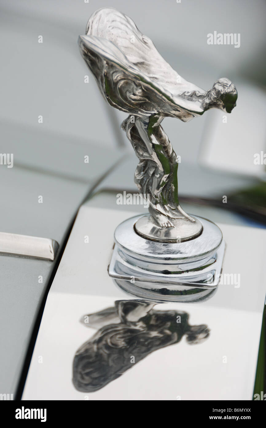 A sideview detail of a RollsRoyce car and its logo the famous winged  woman statue Stock Photo  Alamy