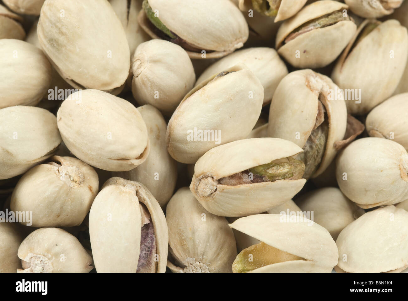 close up of fresh pistachio nuts for backgrounds Stock Photo