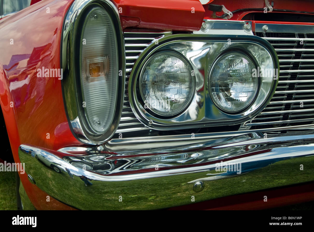 Classic Cars car Auto Automobile Antique Autos 60's 70's dodge chrysler headlights Red Chrome Bumper Grille Stock Photo