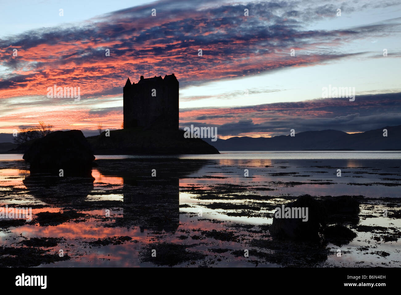 Castle Stalker at sunset Appin Strathclyde Scotland UK Stock Photo