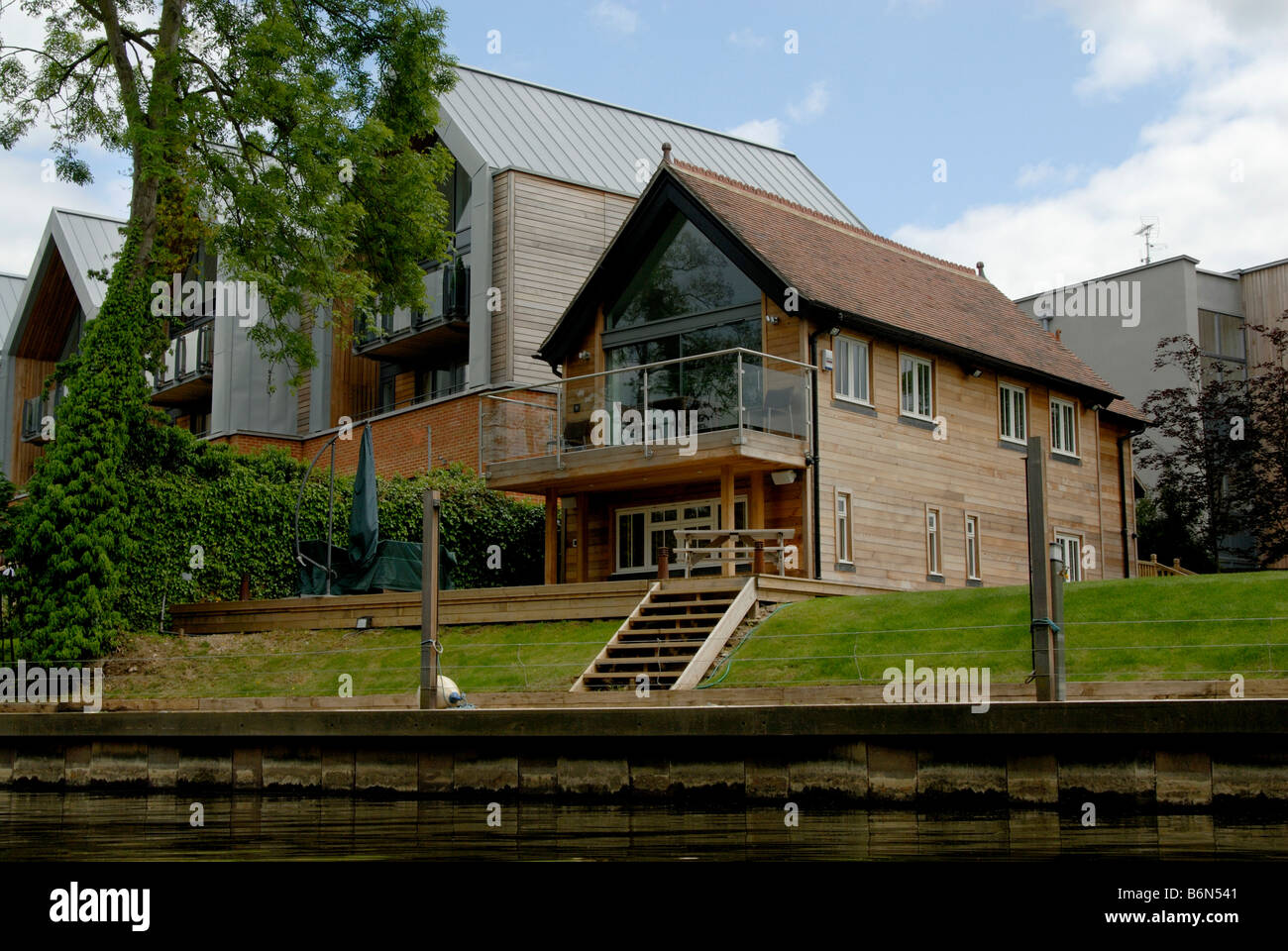 Modern riverside housing development (2008) overlooking River Thames, Weybridge, Surrey, England Stock Photo