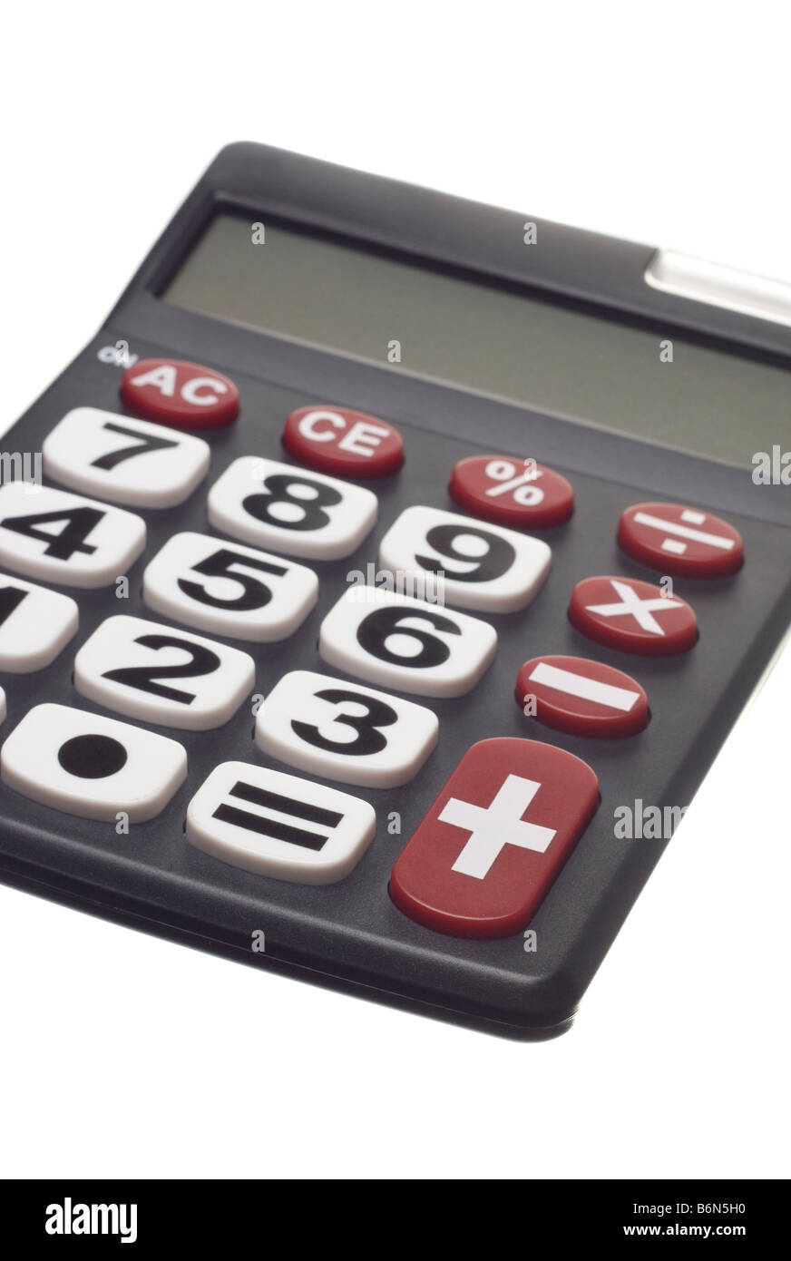 a dark calculator machine with big numbers and buttons Stock Photo - Alamy