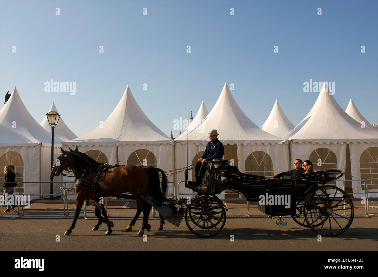 Hackney carriages in front of Alte Hofburg building near Heldenplatz in Vienna Austria Stock Photo