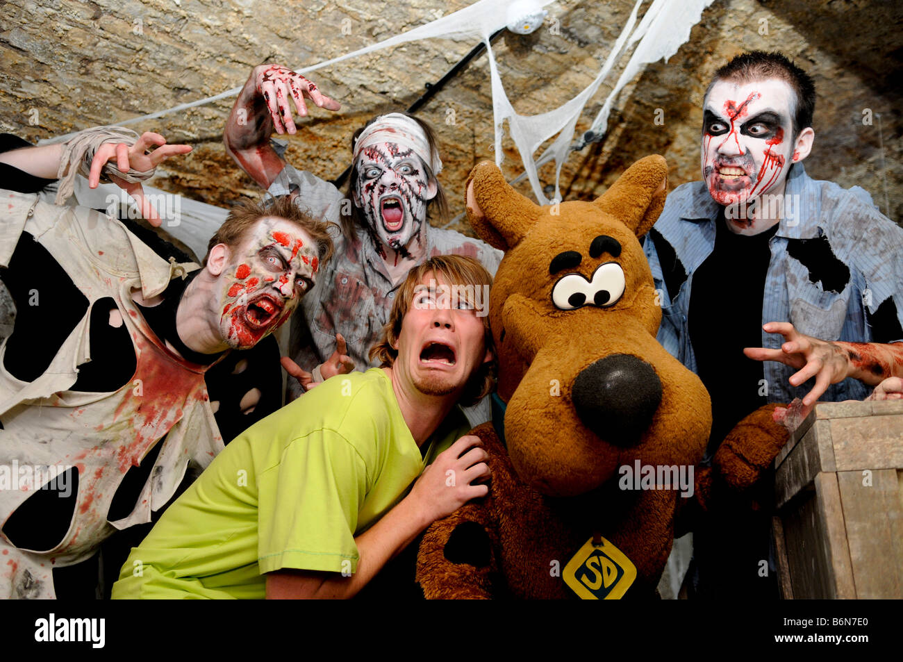 Scooby-Doo poses with zombies at The London Tombs Stock Photo