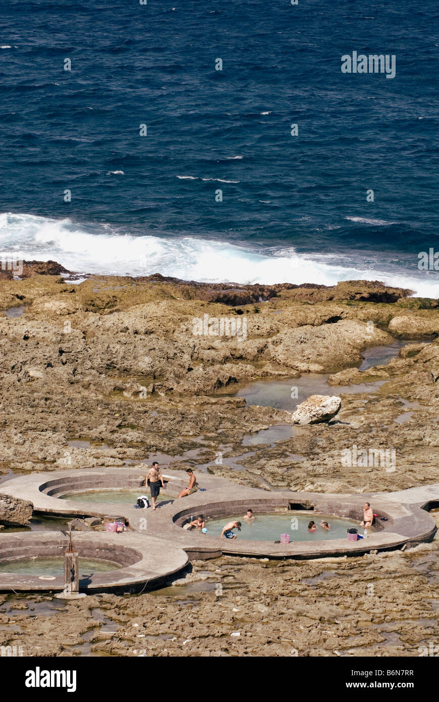 Taiwan, People Enjoying Green Island Jhaorih Saltwater Hot Springs Stock Photo