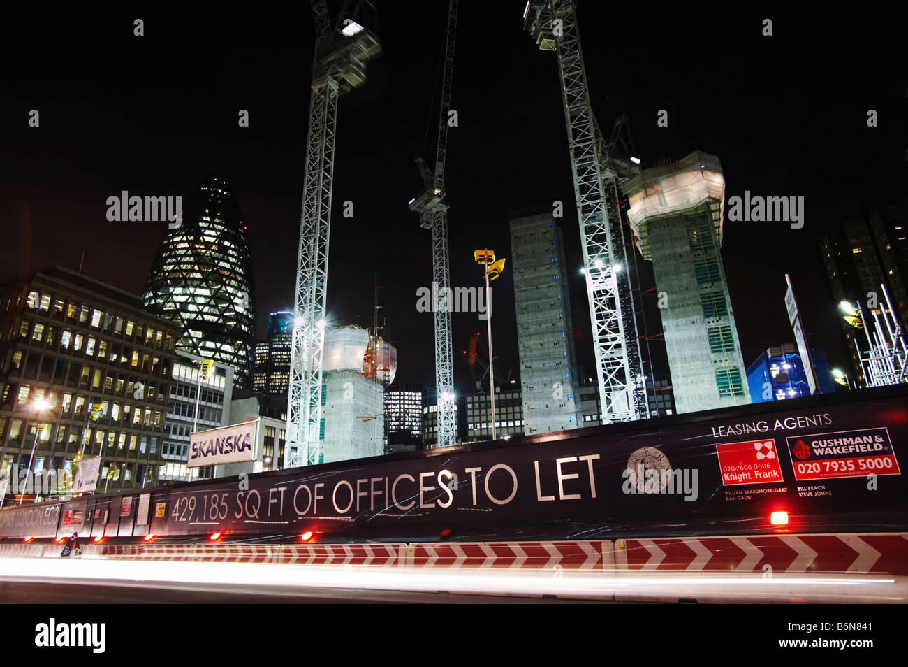 new office building site construction space cranes at night in city of london england britain uk Stock Photo