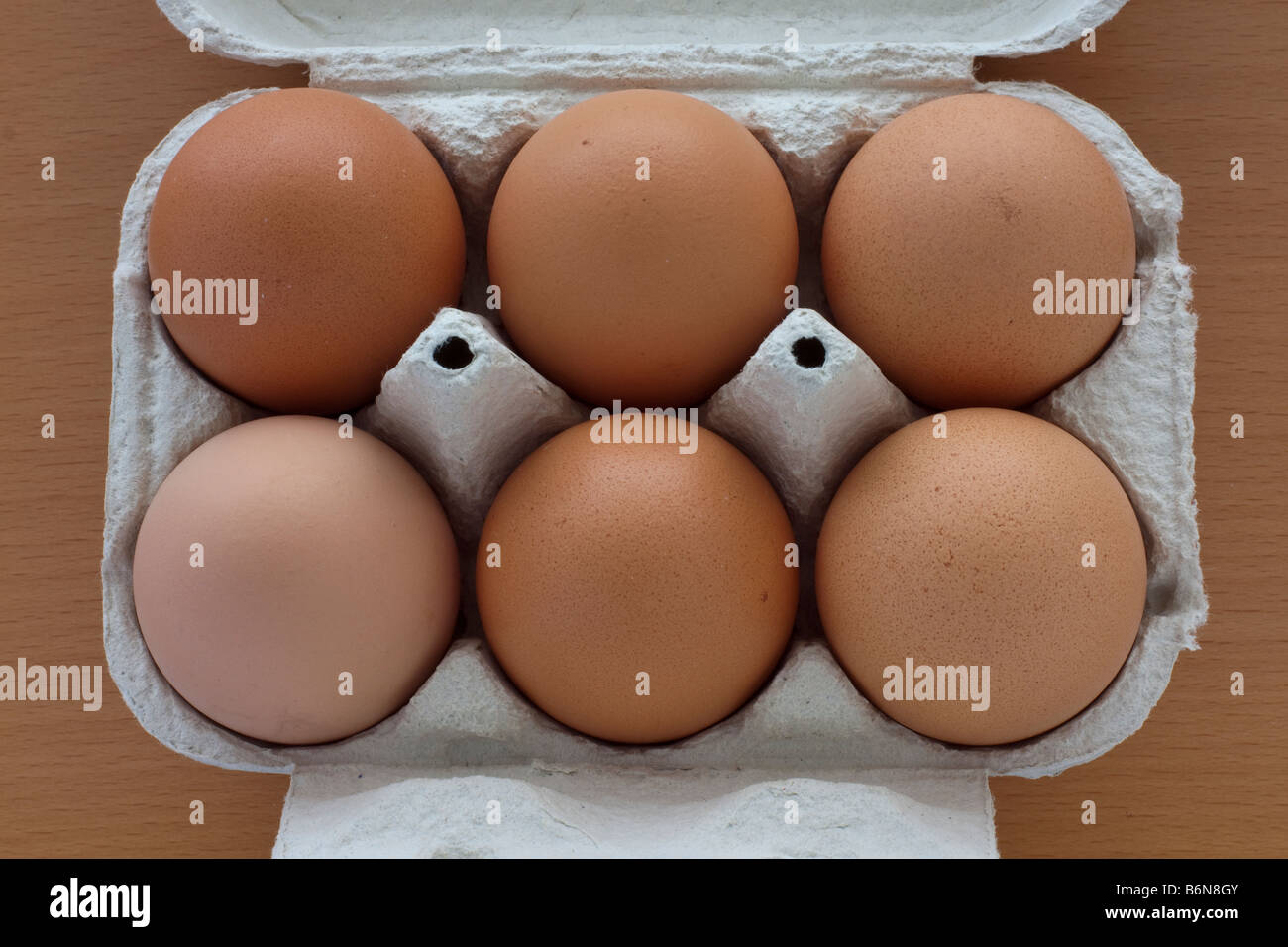 Half dozen chicken eggs Stock Photo