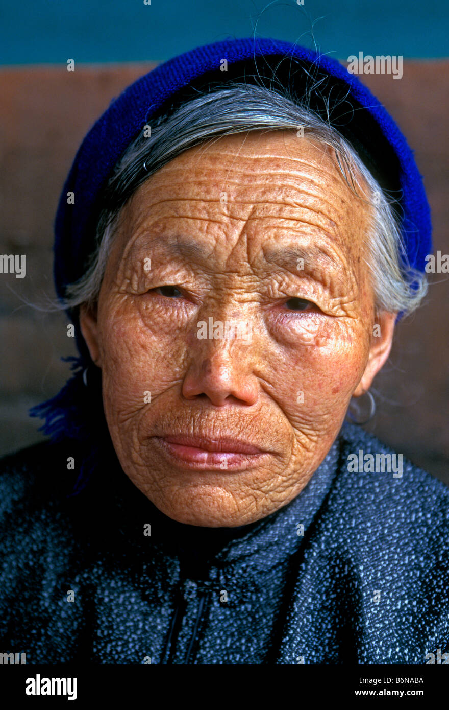1, one, Chinese woman, old woman, elderly woman, mature woman, senior  citizen, head shot, portrait, eye contact, front view, Beijing, China, Asia  Stock Photo - Alamy
