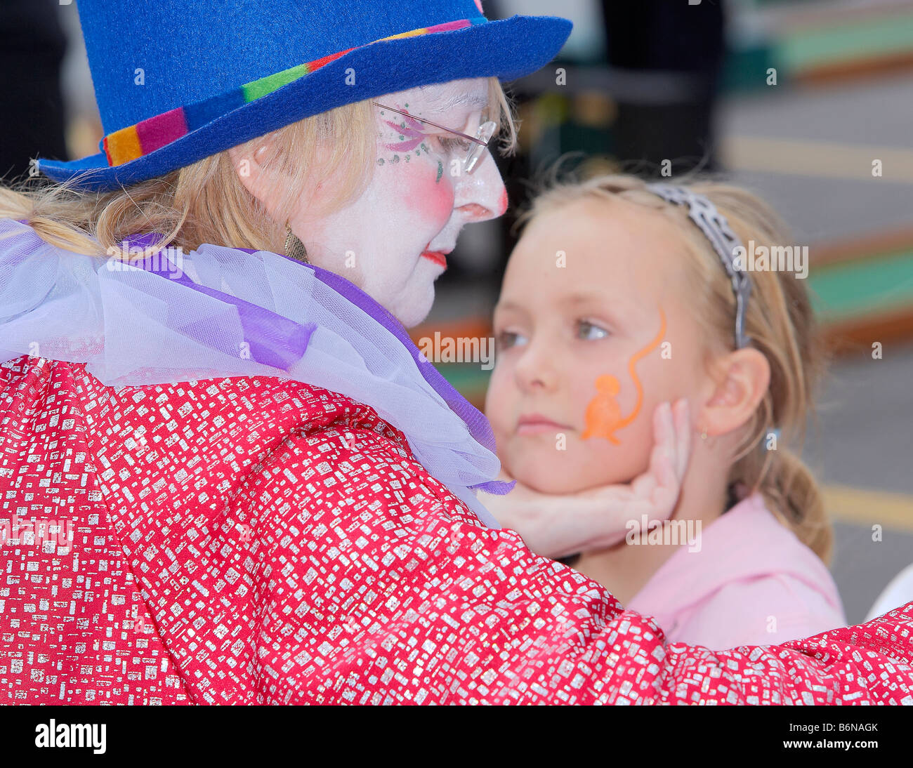 Child with clown face painting hi-res stock photography and images - Alamy