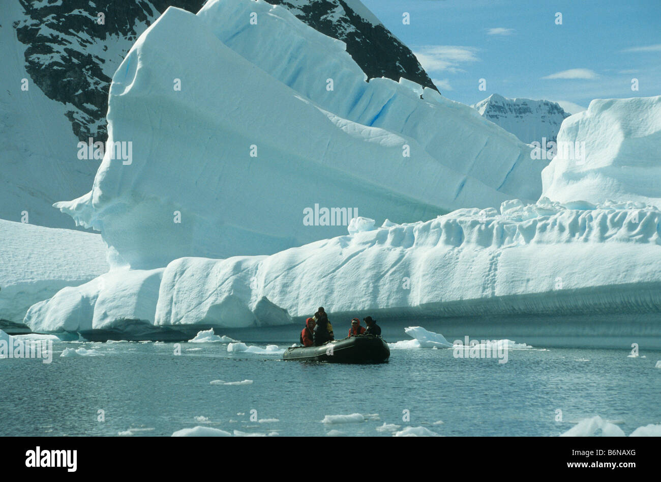 Zodiac cruise between the icebergs in Pleneau Bay, south of the Lemaire Channel, Antarctica Stock Photo