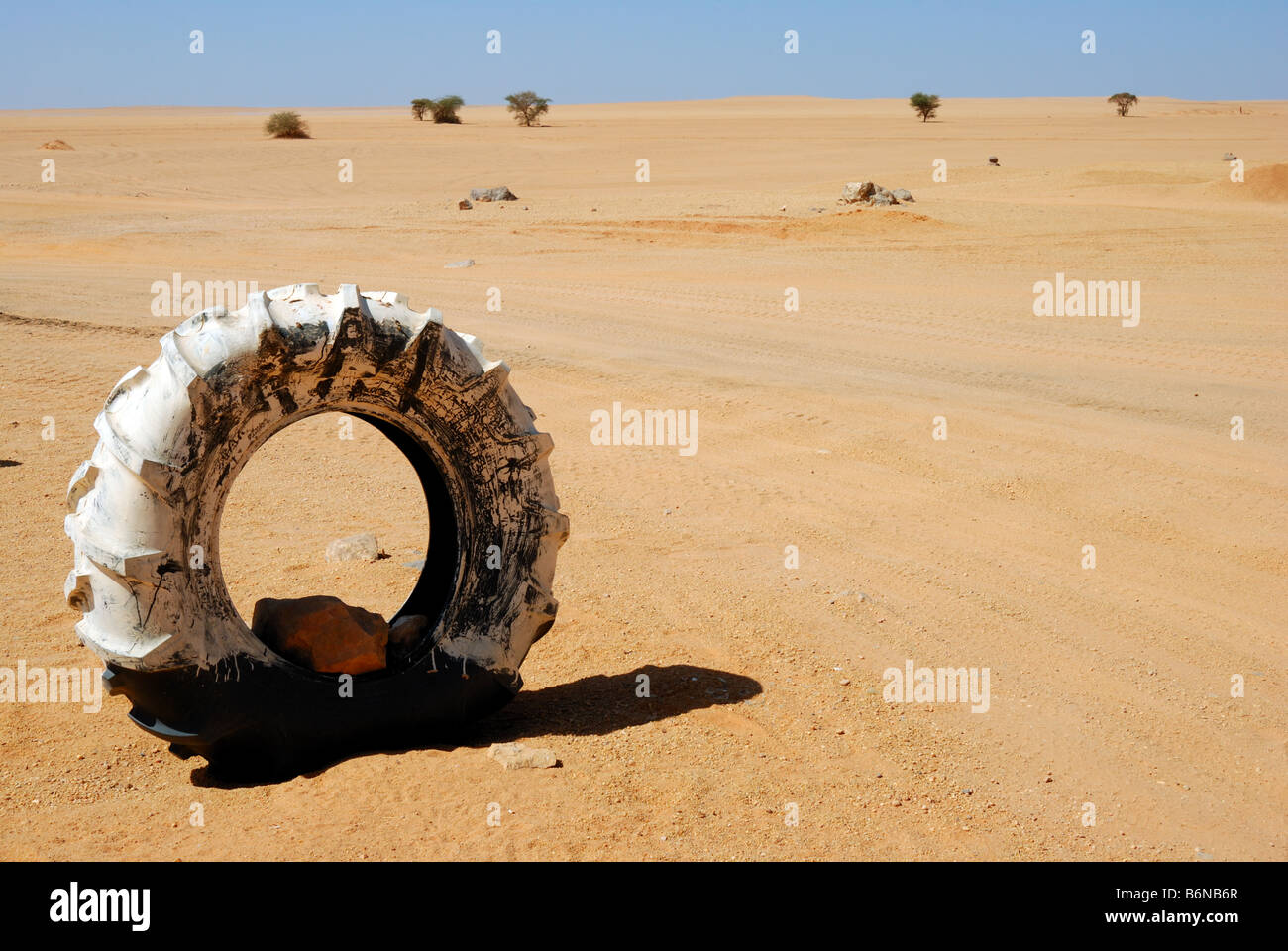 Truck wheel in desert Stock Photo