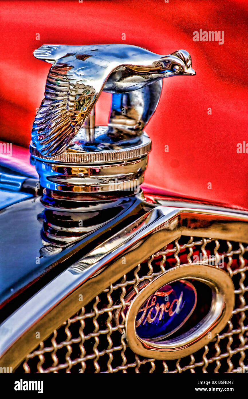 Photo illustration painterly effect of antique car hood ornament or mascot on an old Ford automobile. Stock Photo