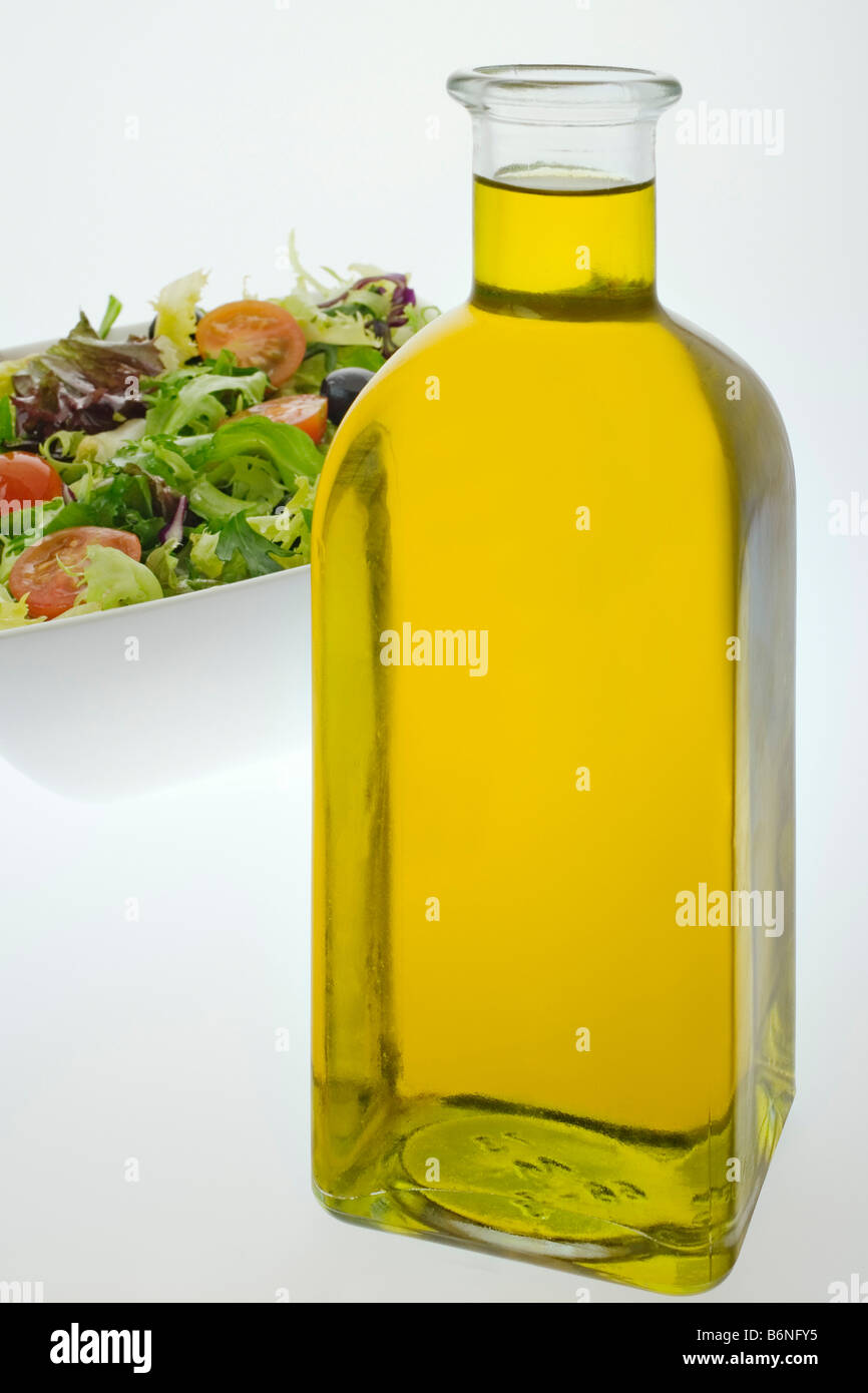 Extra virgin olive oil and salad typical of the Mediterranean diet aceite de oliva virgen extra ensalada dieta mediterranea Stock Photo