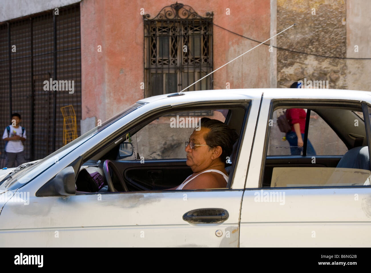 Driver in a car Merida Yucatan Mexico Stock Photo Alamy