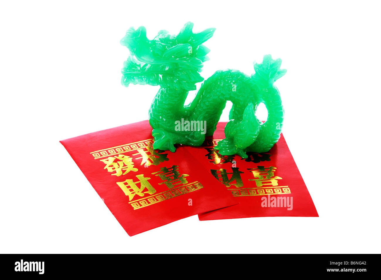 Jade Dragon Ornament and Red Packets Stock Photo