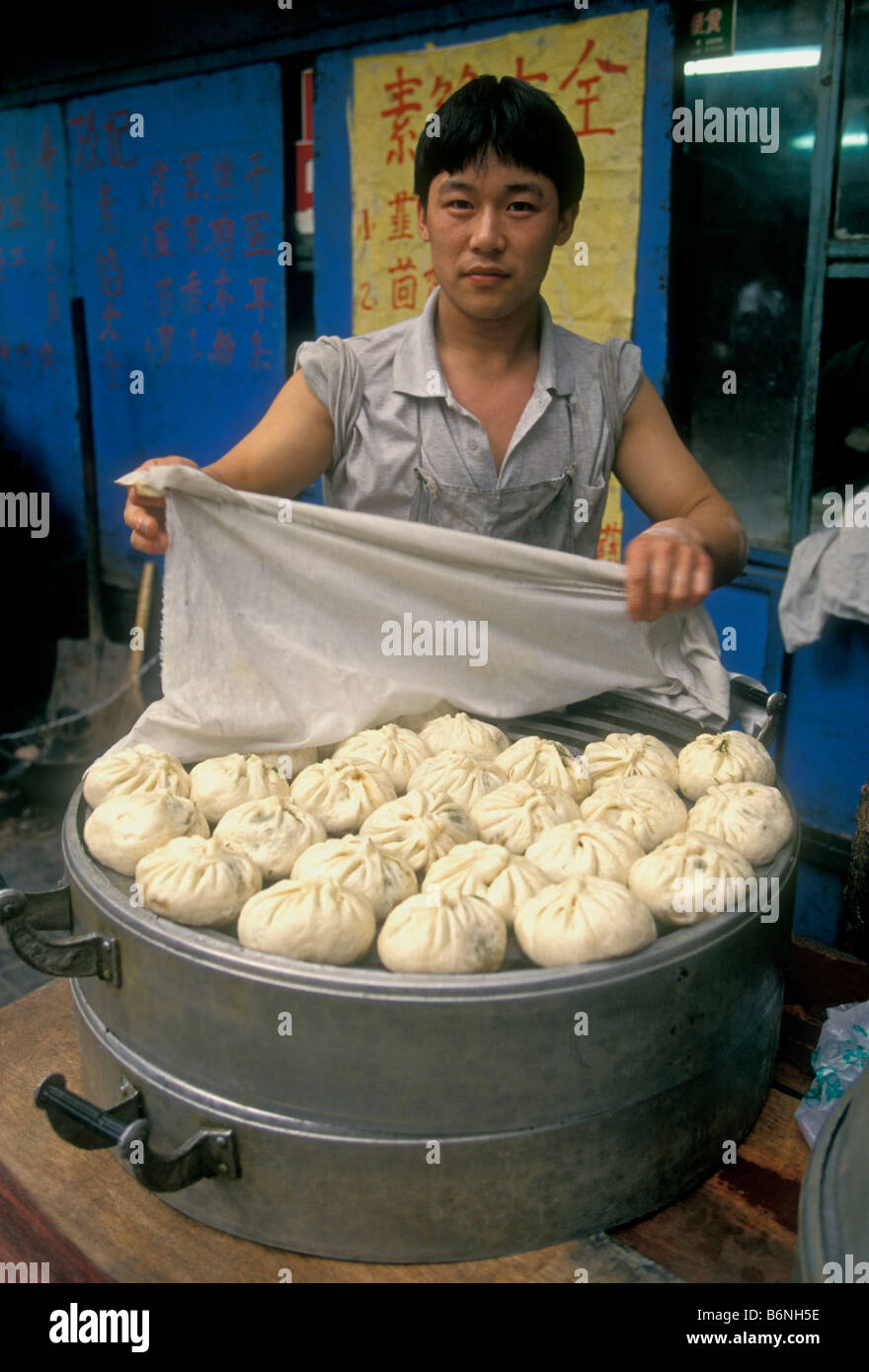 Chinese man, pork bun vendor, pork bun seller, selling steamed pork