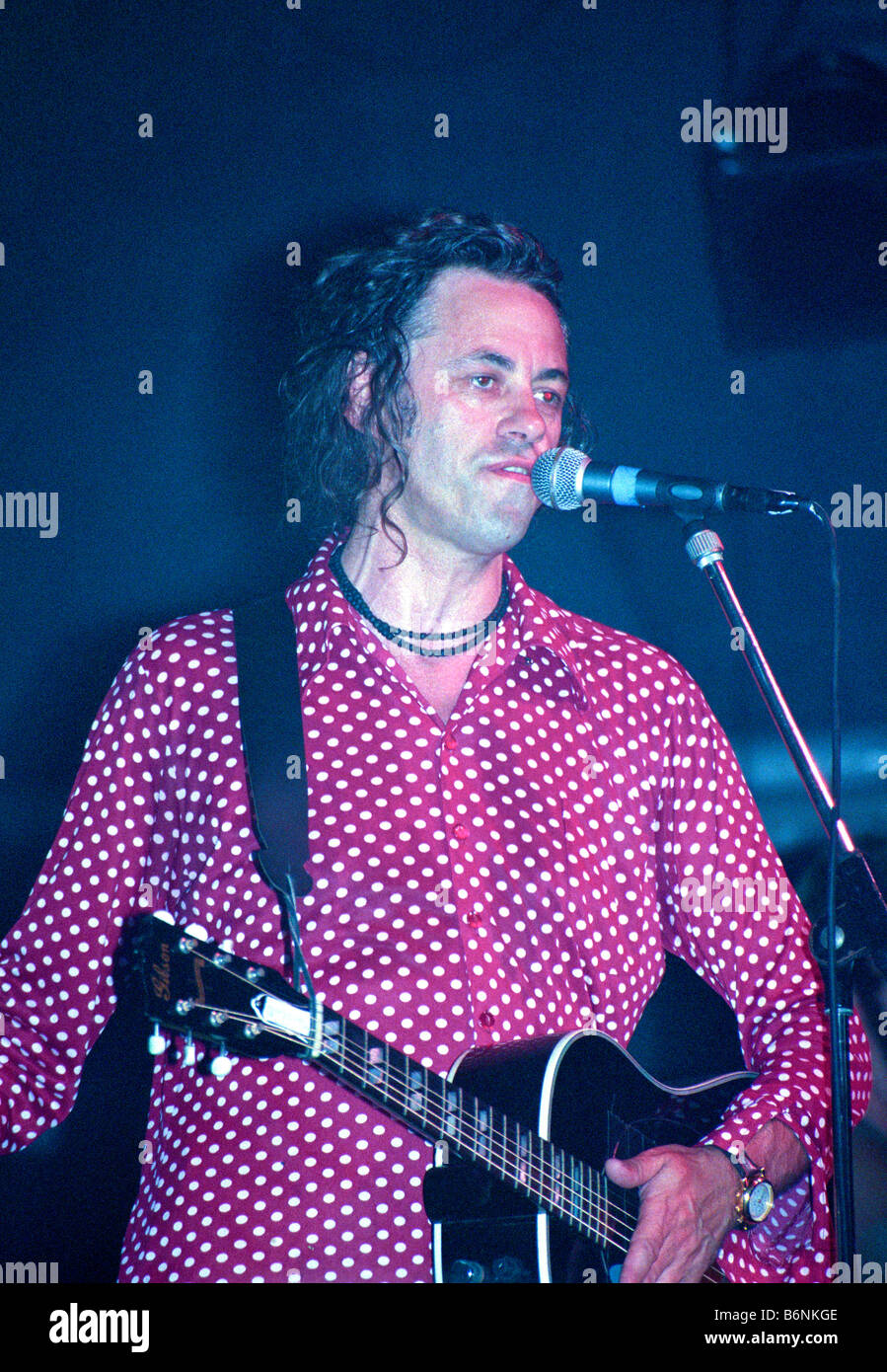 Sir Bob Geldof performing live singing at concert festival event Stock