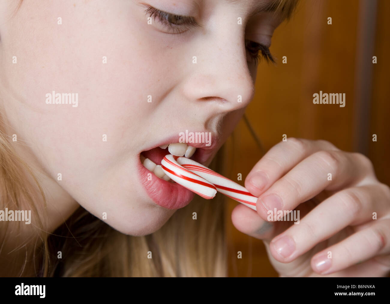 Child eating candy cane hi-res stock photography and images - Page 2 - Alamy