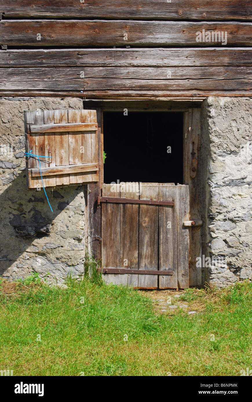 door of old stable Swiss Alps Switzerland Stock Photo