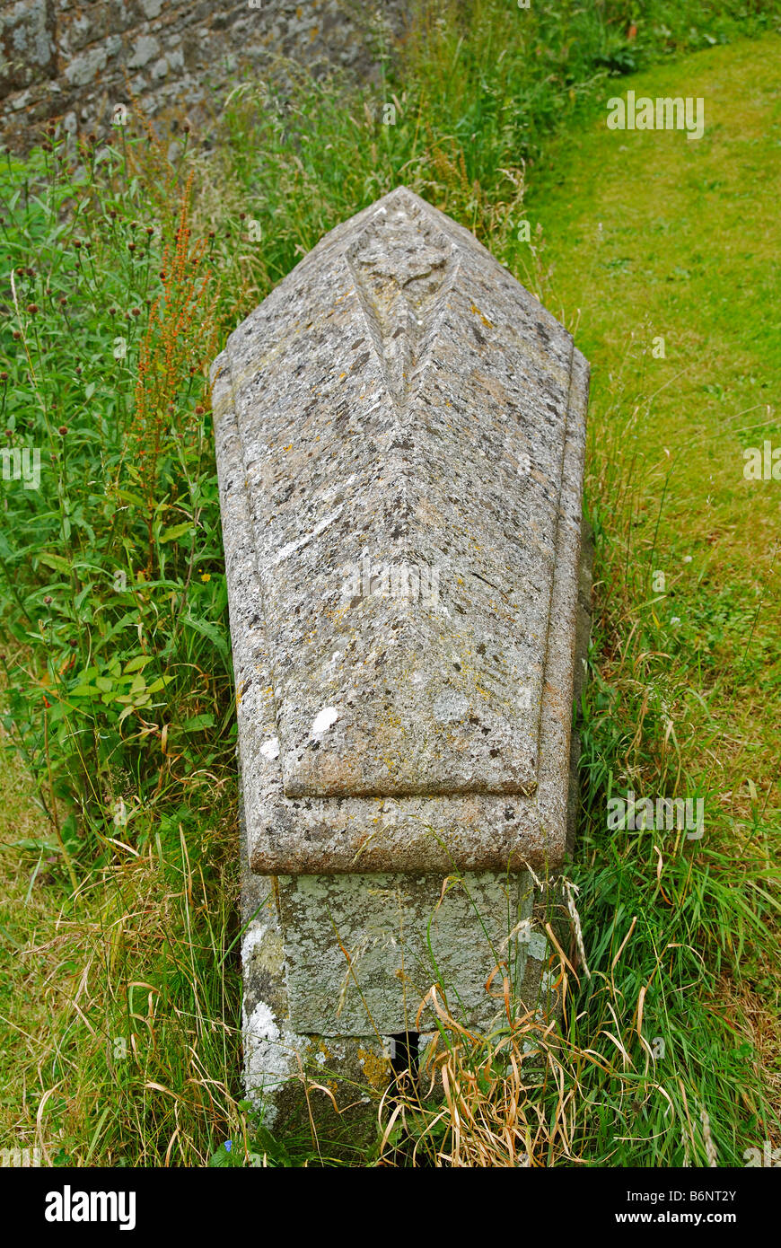 a granite tomb in a village graveyard in cornwall,uk Stock Photo