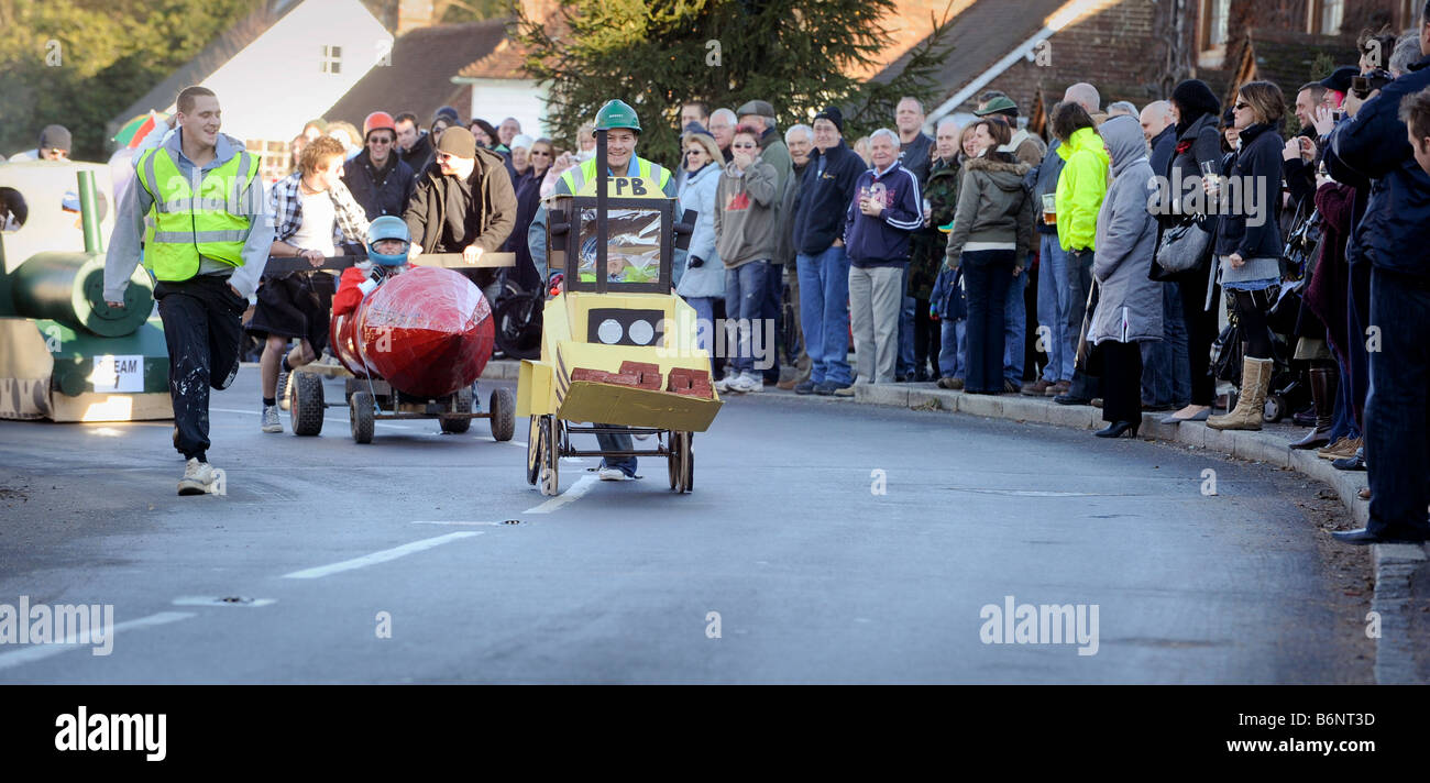 Villagers of East Hoathly in East Sussex taking part in their annual Boxing Day pram race. Picture by Jim Holden. Stock Photo