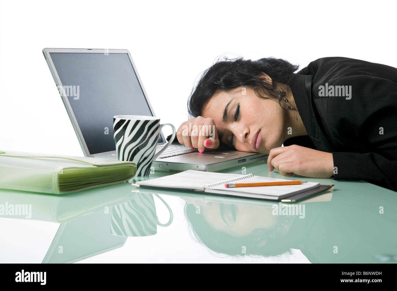 Pretty young businesswoman fallen asleep at her desk Stock Photo - Alamy