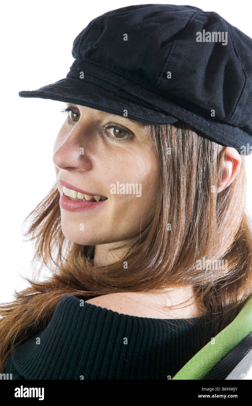 Pretty woman sitting in an chair against a white background Stock Photo ...