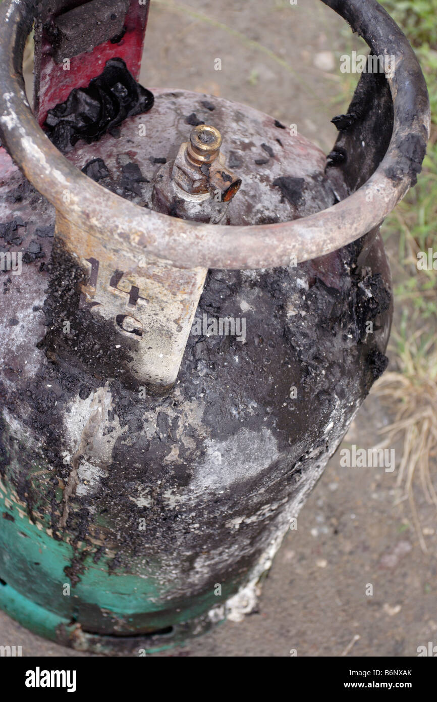 Damaged cooking gas cylinder caused by fire Stock Photo Alamy