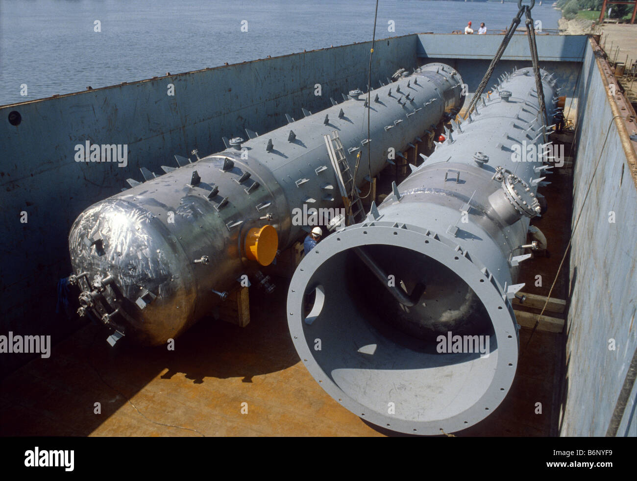 Loading of Plant Components (Reactor Tubes) in the Port of Deggendorf, Danube, Germany. Stock Photo