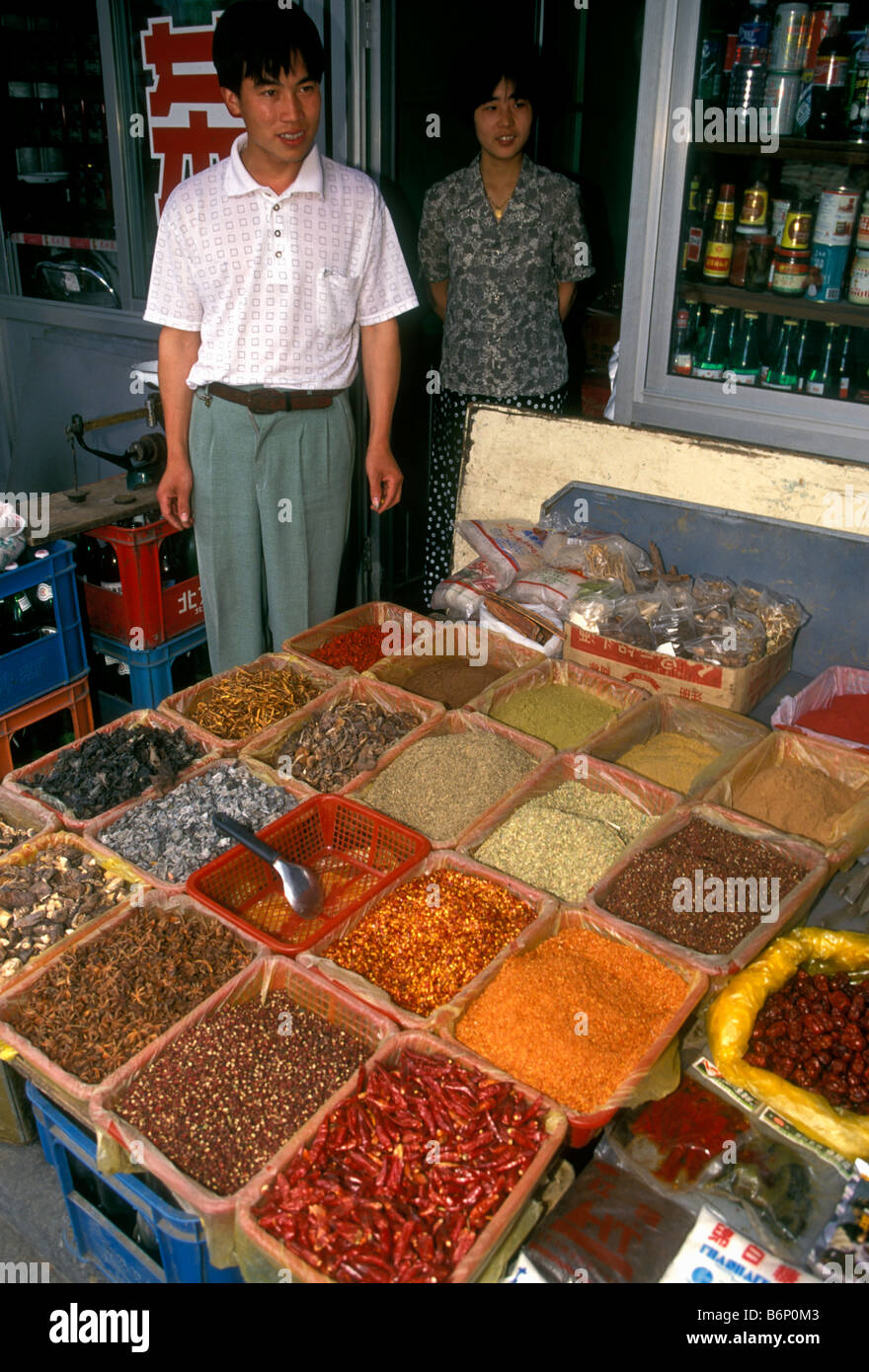 Chinese man, spice vendor, selling spices, spices, grain vendor, grains