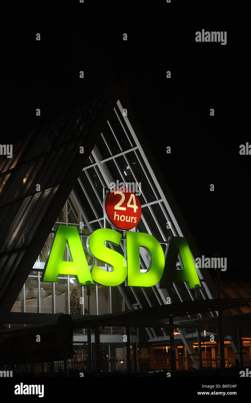 ILLUMINATED ASDA SUPERMARKET STORE SIGN WITH  OPEN 24 HOURS SIGNS RE LATE NIGHT SHOPPERS SHOPPING OPEN OPENING ETC UK Stock Photo