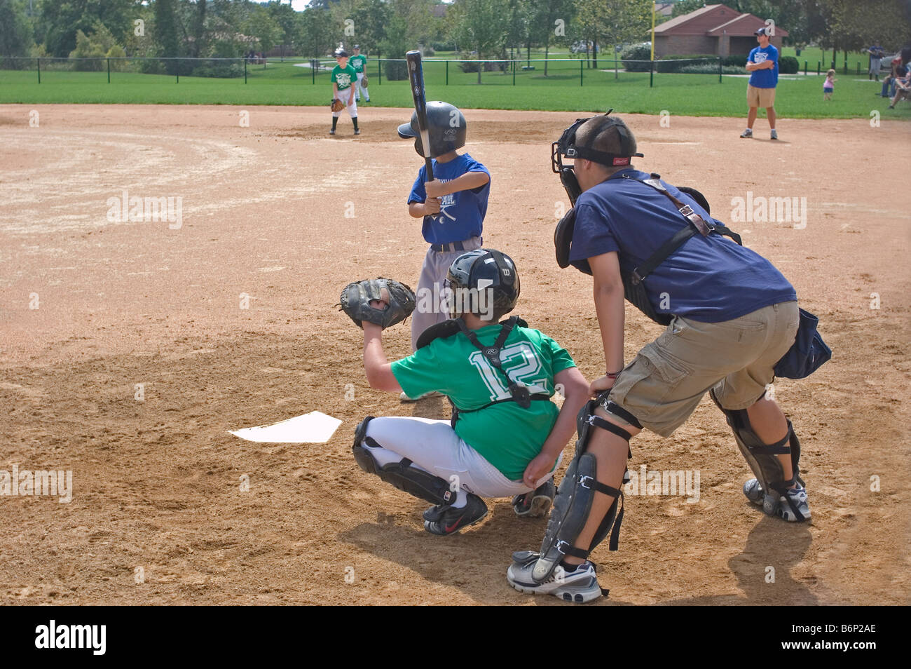 Little League baseball, batter, catcher, umpire, home plate, base, sports fitness, field, infield, Ohio USA Stock Photo