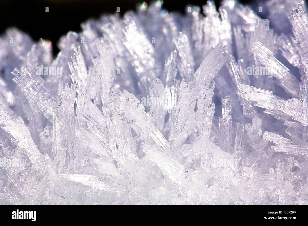 Close up image of ice crystals forming in bunches and groups Stock Photo