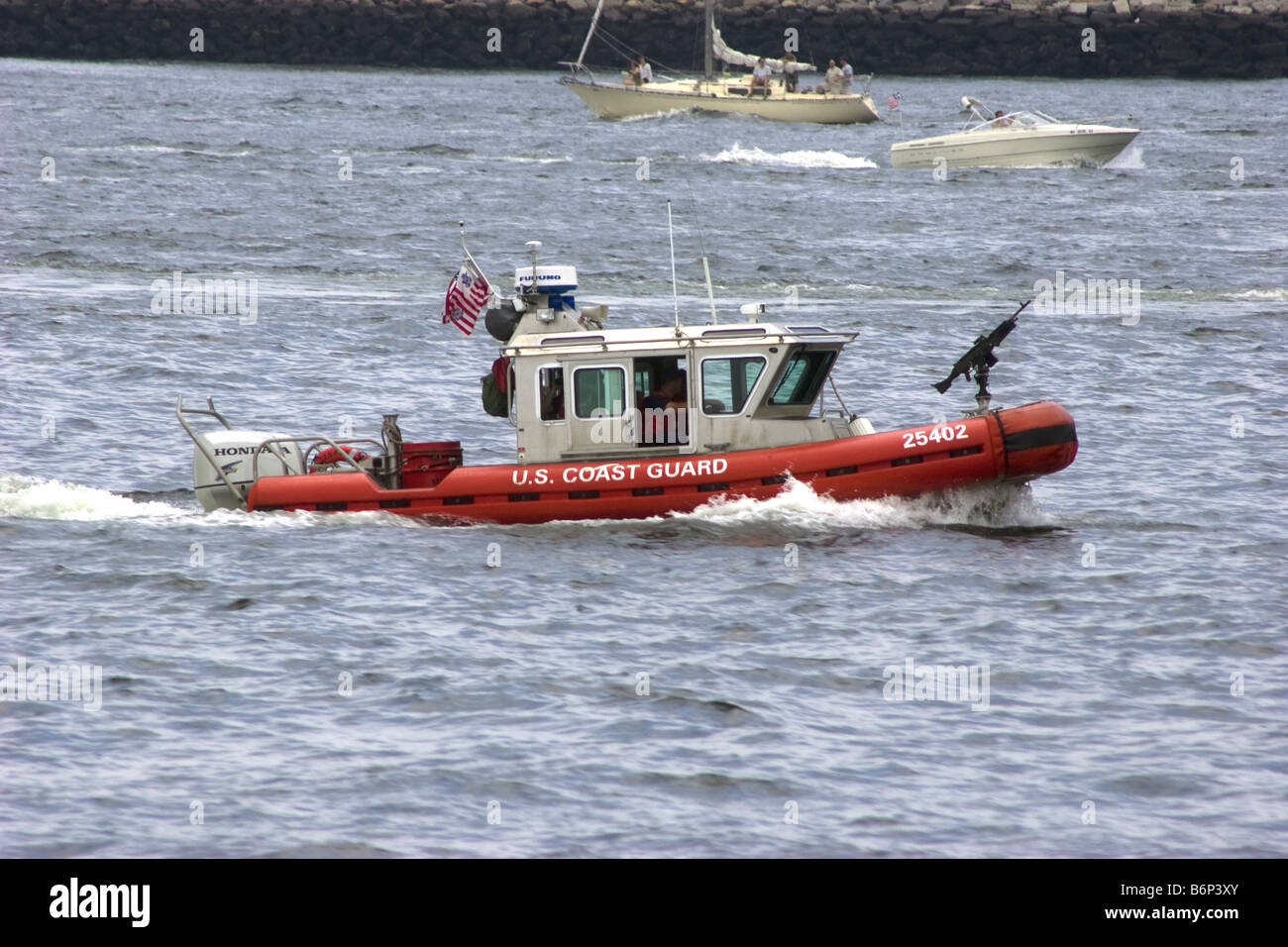U.S. Coast Guard Defender Class Response Boat patrols Boston Harbor Boston Massachusetts Stock Photo