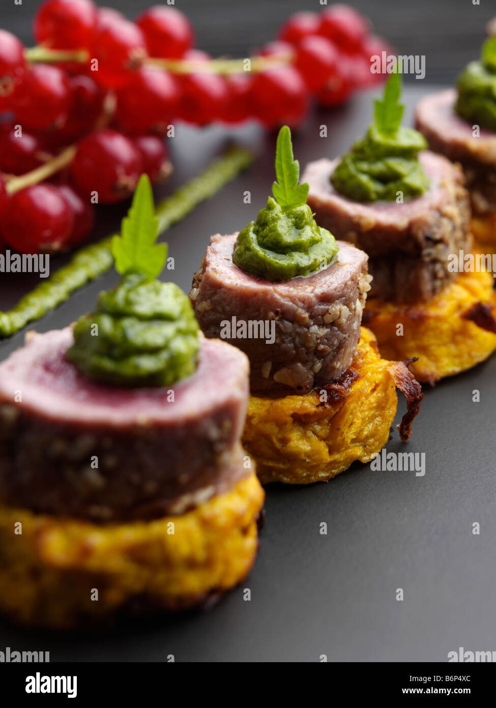 Lamb on a sweet potato rosti with salsa verde gourmet canapes Stock Photo -  Alamy