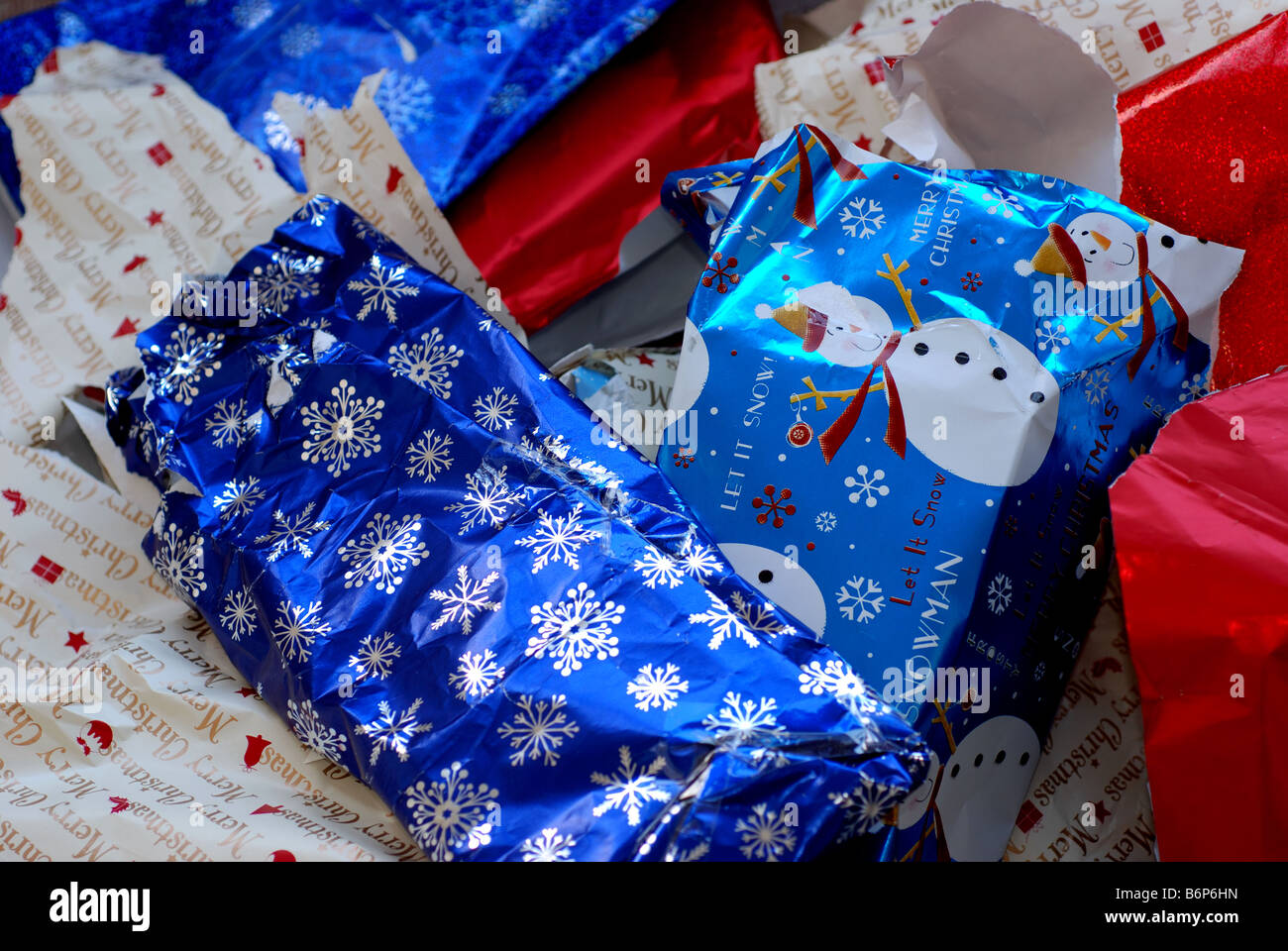 Used Christmas wrapping paper UK Stock Photo - Alamy