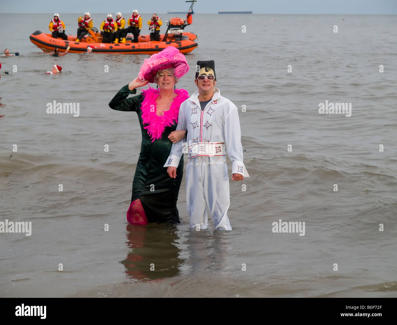 Bathers in the sea in a Boxing Day Charity swim in Redcar Cleveland UK Stock Photo
