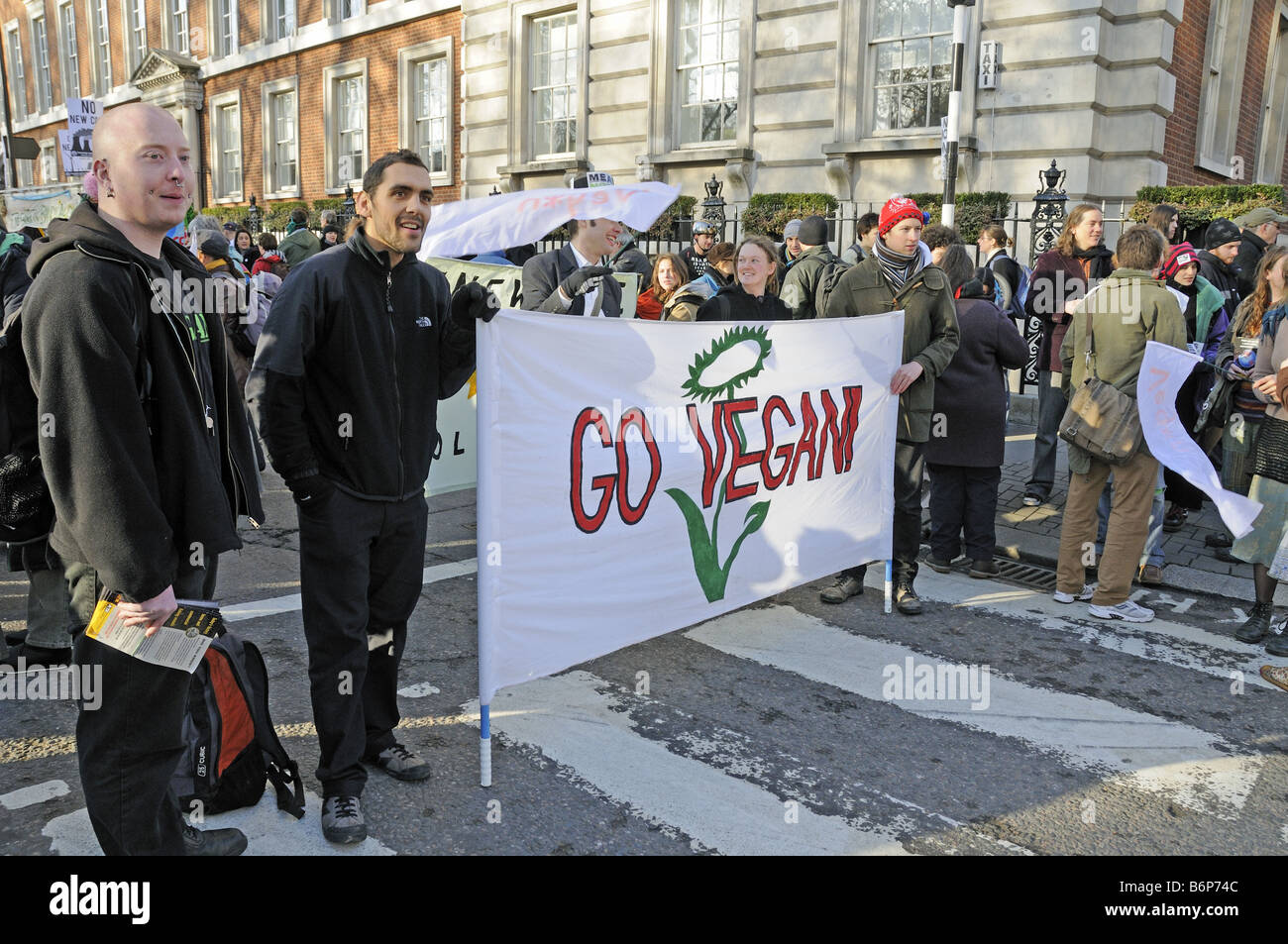 Go Vegan banner at the Climate Change March London England UK Stock Photo