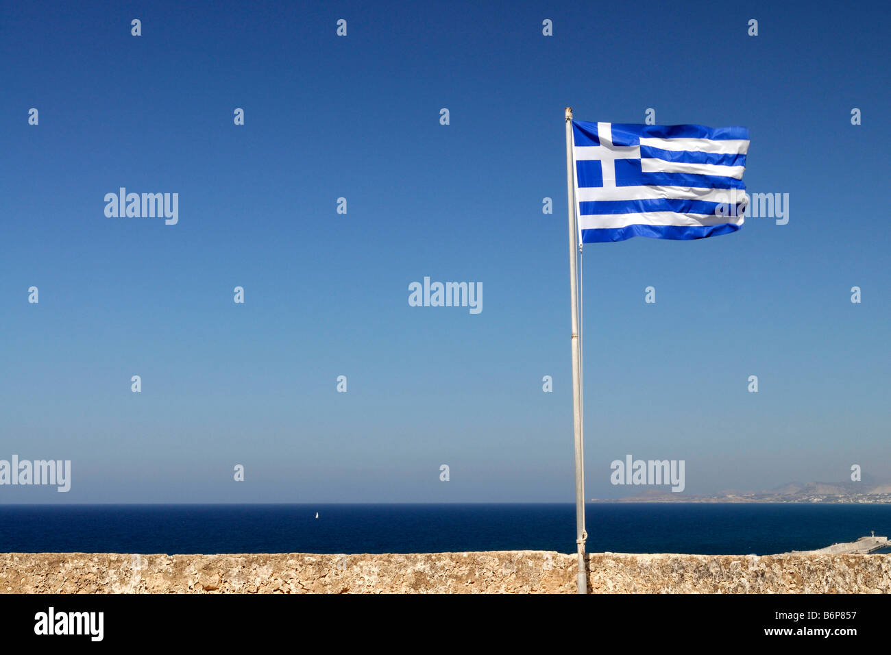 The Greek Flag flies in the historic Venetian Fort in Rethymnon on the island of Crete Europe Greece Stock Photo