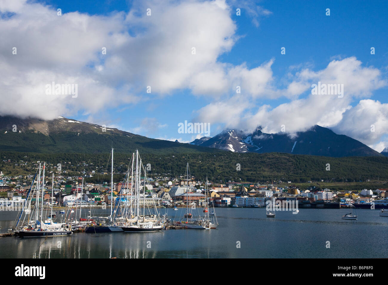 Yachts in early morning light Ushuaia harbor harbour and town Tierra del Fuego Argentina South America Stock Photo