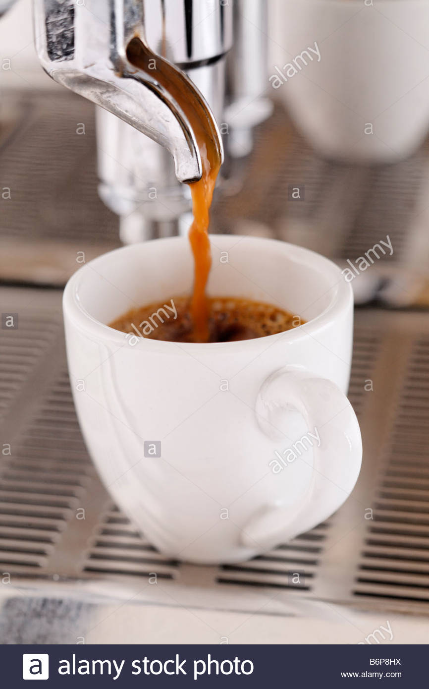 Espresso Machine Pouring Coffee Into Cup Espresso Machine Pouring Coffee Into Cup